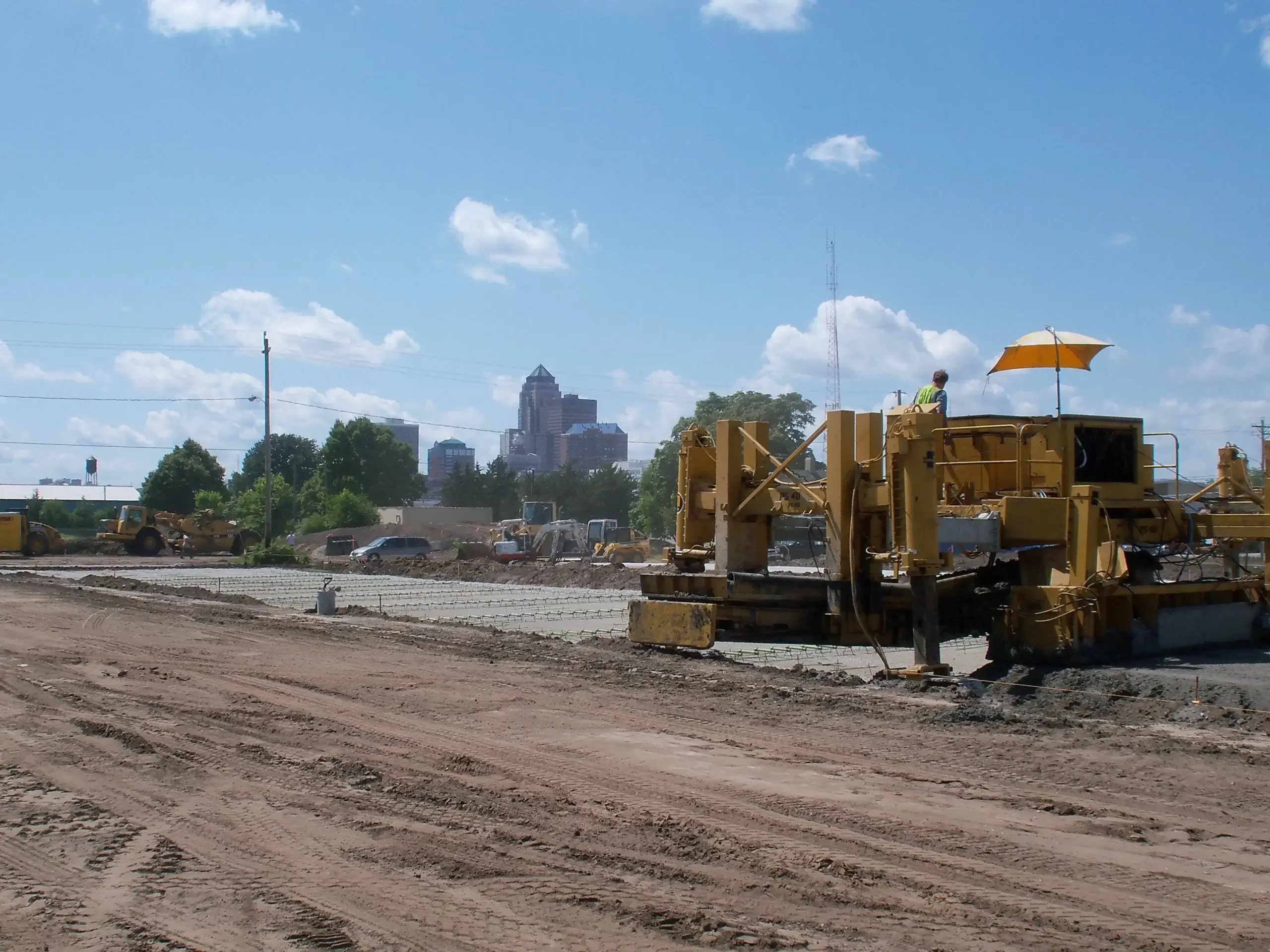 paving construction near SE 6th Street in 2009 with downtown des moines in background